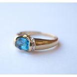 BLUE TOPAZ AND DIAMOND DRESS RING