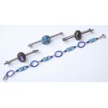 SELECTION OF SILVER JEWELLERY
comprising a blue enamel decorated bar brooch and matching bracelet,