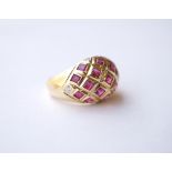 RUBY CLUSTER DRESS RING
the rubies in bombe setting, on eighteen carat gold shank,