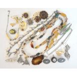 LOT OF COSTUME JEWELLERY
including an agate and hard stone bead necklace, a stone set silver brooch,