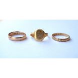 TWO VICTORIAN EIGHTEEN CARAT GOLD RINGS
one with floral decoration,