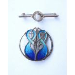 SCOTTISH SILVER AND ENAMEL CIRCULAR BROOCH
with stylised bird design, Edinburgh 1985, 3.