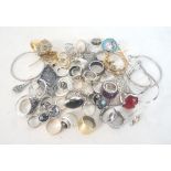 GOOD SELECTION OF VARIOUS COSTUME JEWELLERY RINGS AND EARRINGS
of various designs including silver,