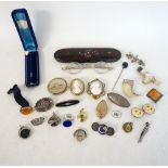 COLLECTION OF VICTORIAN AND LATER JEWELLERY
includes cameo, tiger claw and other brooches, fobs,