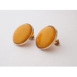 PAIR OF BUTTERSCOTCH AMBER EARRINGS
set in nine carat gold, each 2.