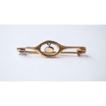 EDWARDIAN OPAL BAR BROOCH
set in nine carat gold, 4.