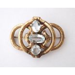 DECORATIVE VICTORIAN AQUAMARINE BROOCH
of multi-piece construction, set in engraved unmarked gold,