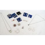 SELECTION OF SILVER JEWELLERY
comprising various pairs of earrings, a marcasite set floral brooch,