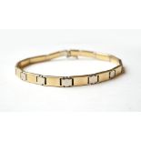 EIGHTEEN CARAT TWO TONE GOLD BRACELET
approximately 20.