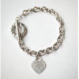 TIFFANY & CO. SILVER BRACELET
and and Tiffany & Co.