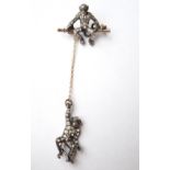 CONTINENTAL SILVER DOUBLE MONKEY BROOCH
early 20th century,