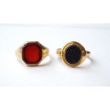 TWO STONE SET RINGS
one set with bloodstone and the other carnelian, both on gold shanks,