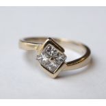 DIAMOND CLUSTER DRESS RING
the four princess cut diamonds in diamond shaped setting totalling