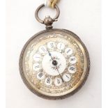 LATE 19th CENTURY SWISS SILVER FOB WATCH
the white enamel dial with painted flowers to the centre