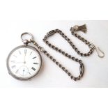 VICTORIAN SILVER CASED POCKET WATCH
with black Roman numerals and subsidiary dial on white enamel,