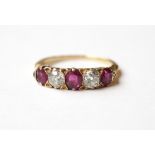 DIAMOND AND RUBY FIVE STONE RING
on unmarked gold shank, the two diamonds totalling approximately 0.