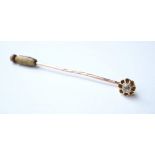 DIAMOND SET STICK PIN
in unmarked gold,