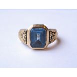 PORTUGUESE BLUE TOPAZ SET RING
the emerald cut topaz in high carat gold setting,