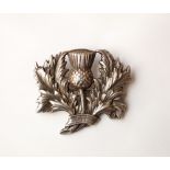 STERLING SILVER PLAID BROOCH
in the form of a thistle, approximately 47.8 grams and 5.