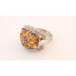 CITRINE, AMETHYST AND DIAMOND CLUSTER DRESS RING
on fourteen carat white gold shank,