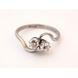 DIAMOND TWIST SET TWO STONE RING
on platinum shank, the diamonds totalling approximately 0.