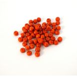 SIXTY-TWO LOOSE CORAL BEADS
originally forming a necklace,