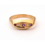 AMETHYST AND DIAMOND FIVE STONE RING
on nine carat gold shank,