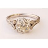 LARGE AND IMPRESSIVE DIAMOND SOLITAIRE RING
the cushion shaped rose cut diamond weighing 3.