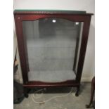 A MAHOGANY DISPLAY CABINET the gadrooned