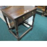 A JACOBEAN OAK SINGLE DRAWER TABLE on bo