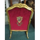 A 19TH CENTURY GILT FIRE SCREEN with ear