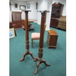 A PAIR OF MAHOGANY TORCHERES each with a