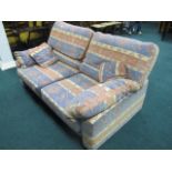 A TWO SEATER SETTEE with loose cushions