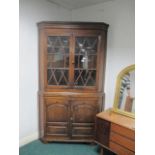 A GOOD GEORGIAN OAK CORNER CABINET the d