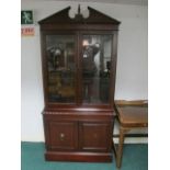 A CHIPPENDALE STYLE MAHOGANY BOOKCASE th