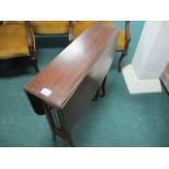 AN EDWARDIAN MAHOGANY SUTHERLAND TABLE t