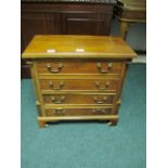 A GEORGIAN STYLE FOUR DRAWER CHEST with