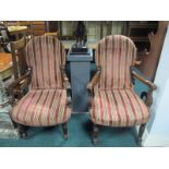 A PAIR OF CONTINENTAL MAHOGANY AND UPHOLSTERED ELBOW CHAIRS each with a rectangular arched back and