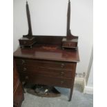 AN EDWARDIAN MAHOGANY DRESSING CHEST the super structure with moulded uprights above two short