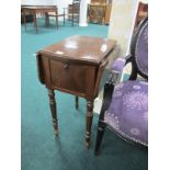 A WALNUT DROP LEAF TABLE of serpentine outline the shaped moulded top above a hinged cupboard