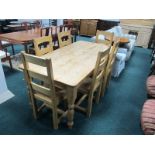 A PINE SEVEN PIECE BREAKFAST SUITE comprising dining table the rectangular top with rounded corners