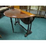 A FINE VICTORIAN ROSEWOOD SUTHERLAND TABLE the oval hinged top raised on duel baluster supports