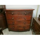 A VICTORIAN MAHOGANY BOW FRONT CHEST the shaped moulded top above two short and three long