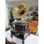 A PINE CASED GRAMOPHONE with brass horn 88cm (h) x 37cm (w) x 37cm (d)