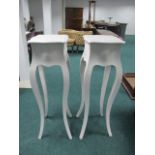 A PAIR OF WHITE PAINTED JARDINIERE STANDS each with a serpentine outline raised on cabriole legs