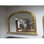 A PAIR OF VICTORIAN STYLE GILT FRAMED OVERMANTEL MIRRORS the rectangular arched plate within a