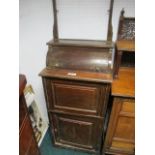 A MAHOGANY SHIPS WASH STAND the hinged compartments containing a tap with cupboards to base 163cm