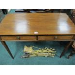 AN EDWARDIAN MAHOGANY SIDE TABLE the rectangular top above two frieze drawers with brass ring