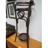 A BENTWOOD WASH STAND of circular form on splayed legs joined by an under tier