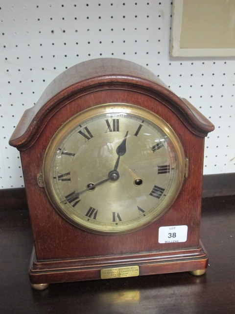 A MAHOGANY CASED MANTLE CLOCK the rectangular arched case with silvered dial and Roman numerals